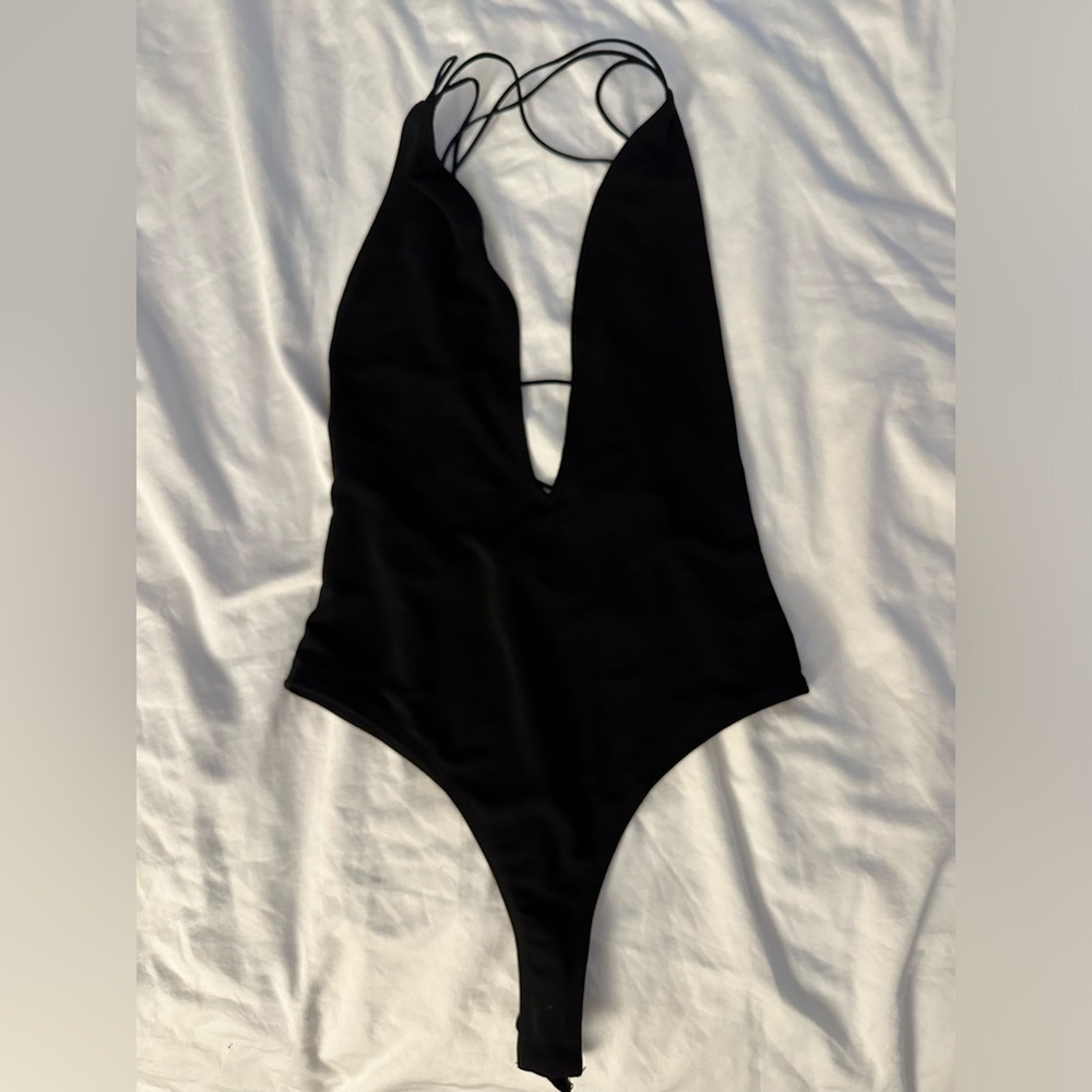 Essue (S) - strappy body suit with thong bottom - new with tags